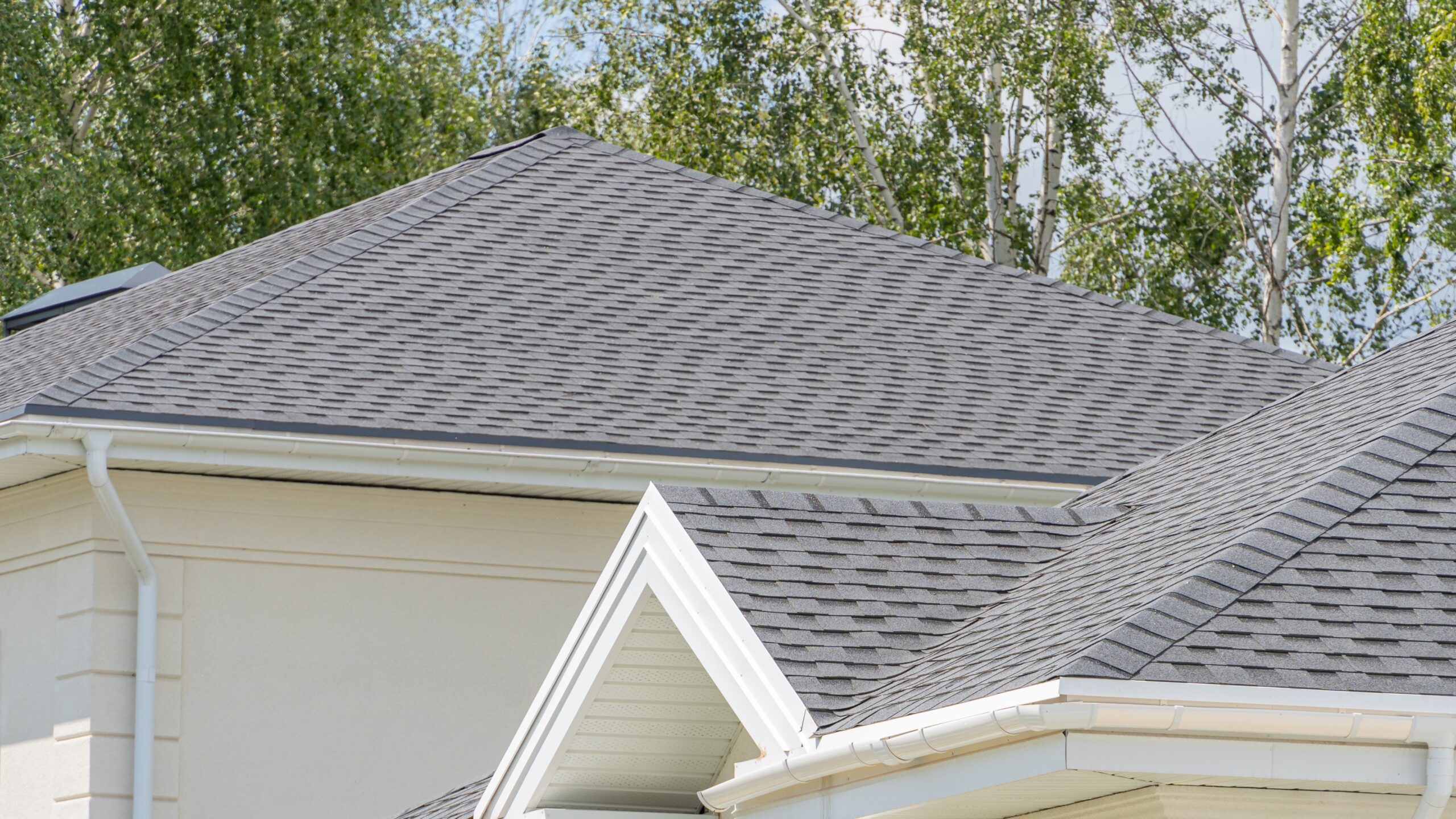 Close-up of roof corner with shingle roofing